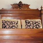 The antique french bed in the Ann Harding room